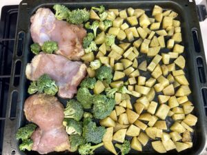 Add the chicken and broccoli to the sheet